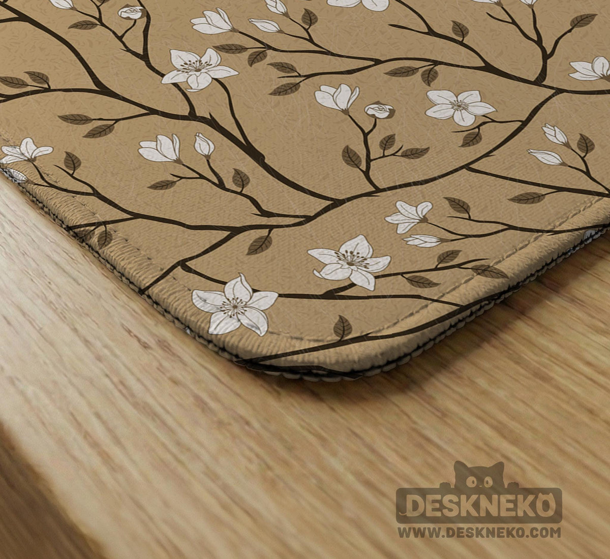 Beige mahjong mat with a white blossom branch floral pattern on a neutral background.