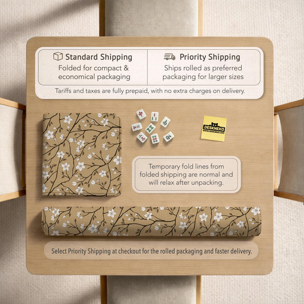 Beige mahjong mat with a white blossom branch floral pattern on a neutral background.