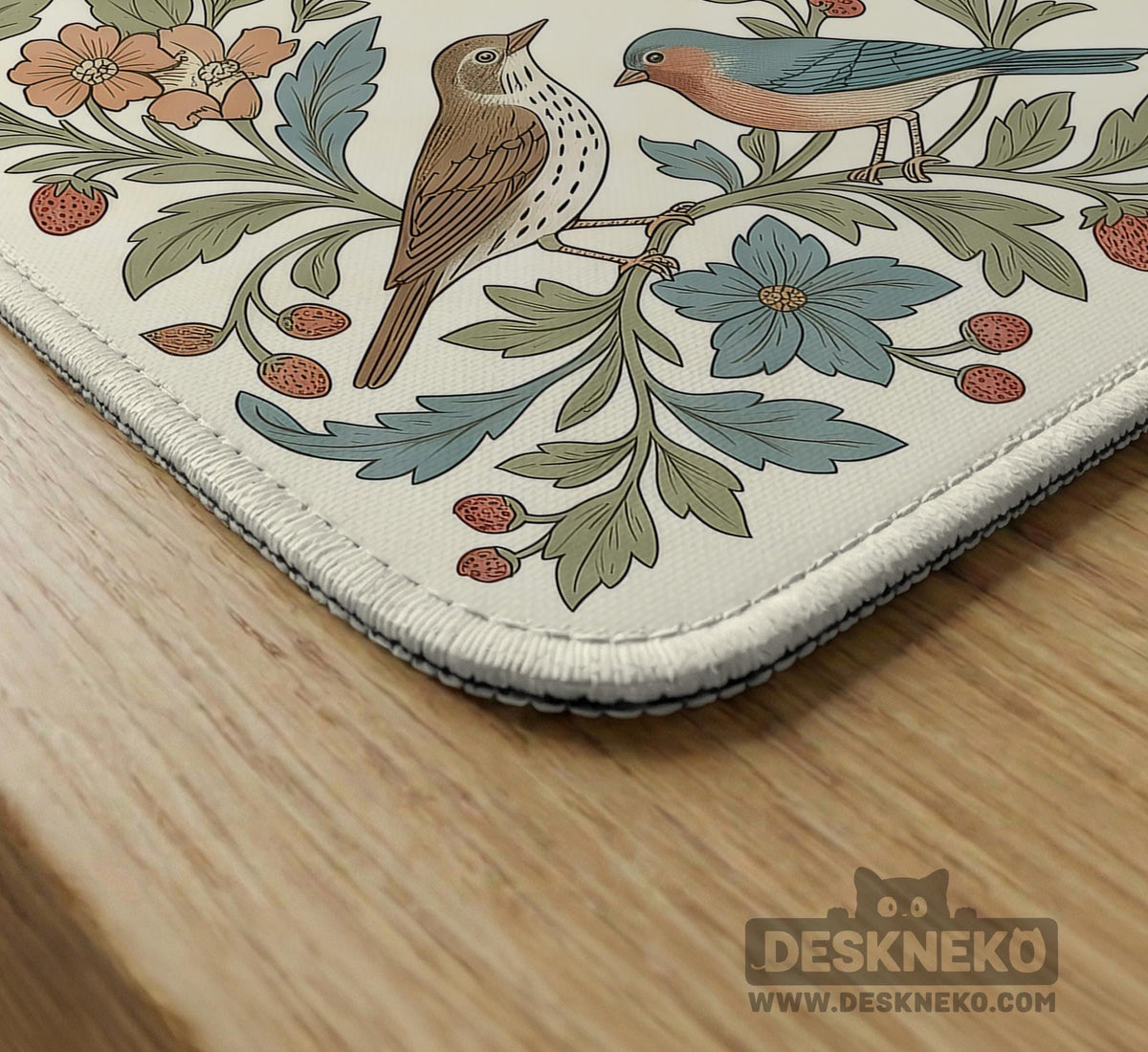 Square mahjong mat with a cream background, blue birds, sage leaves, terracotta flowers, and a decorative botanical border with printed rules text.