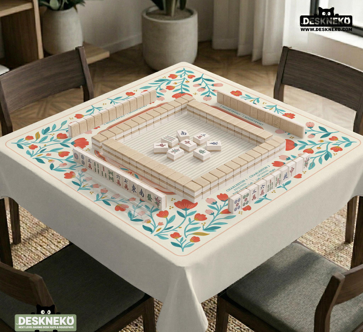 Cream mahjong mat with a coral and teal floral border, rule layout text, Charleston guide notes, and a blank center area for tile play.