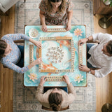 A soft blue mahjong mat with koi fish, floating lily pads, pale floral details, and a watercolor-style pond design.