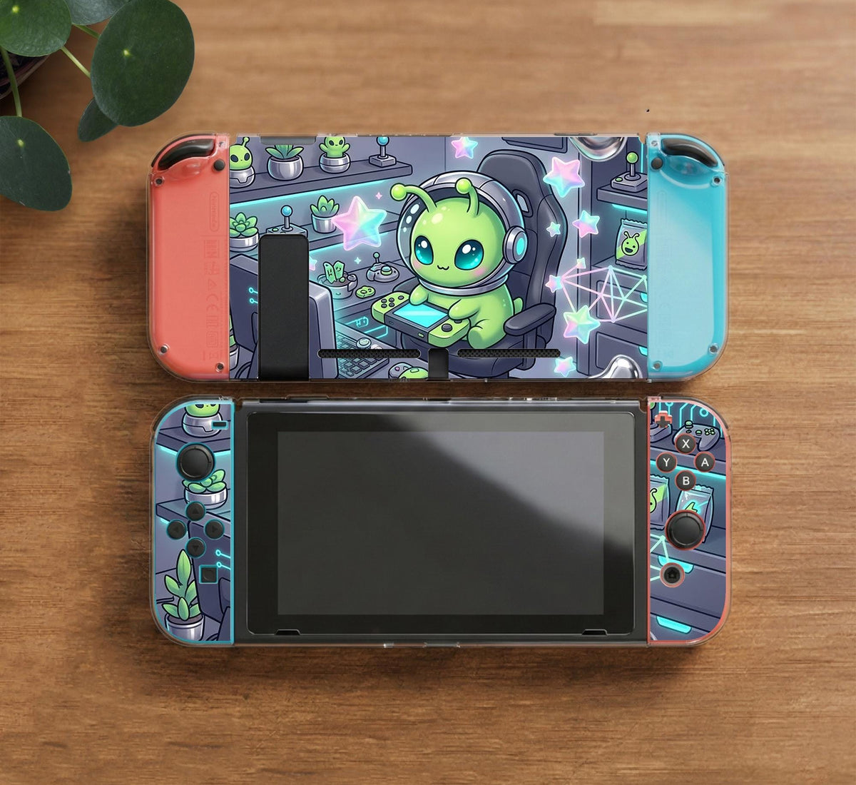 A Switch carrying case design with a cute green alien at a gaming desk, glowing cyan lights, and pastel stars on a dark background.