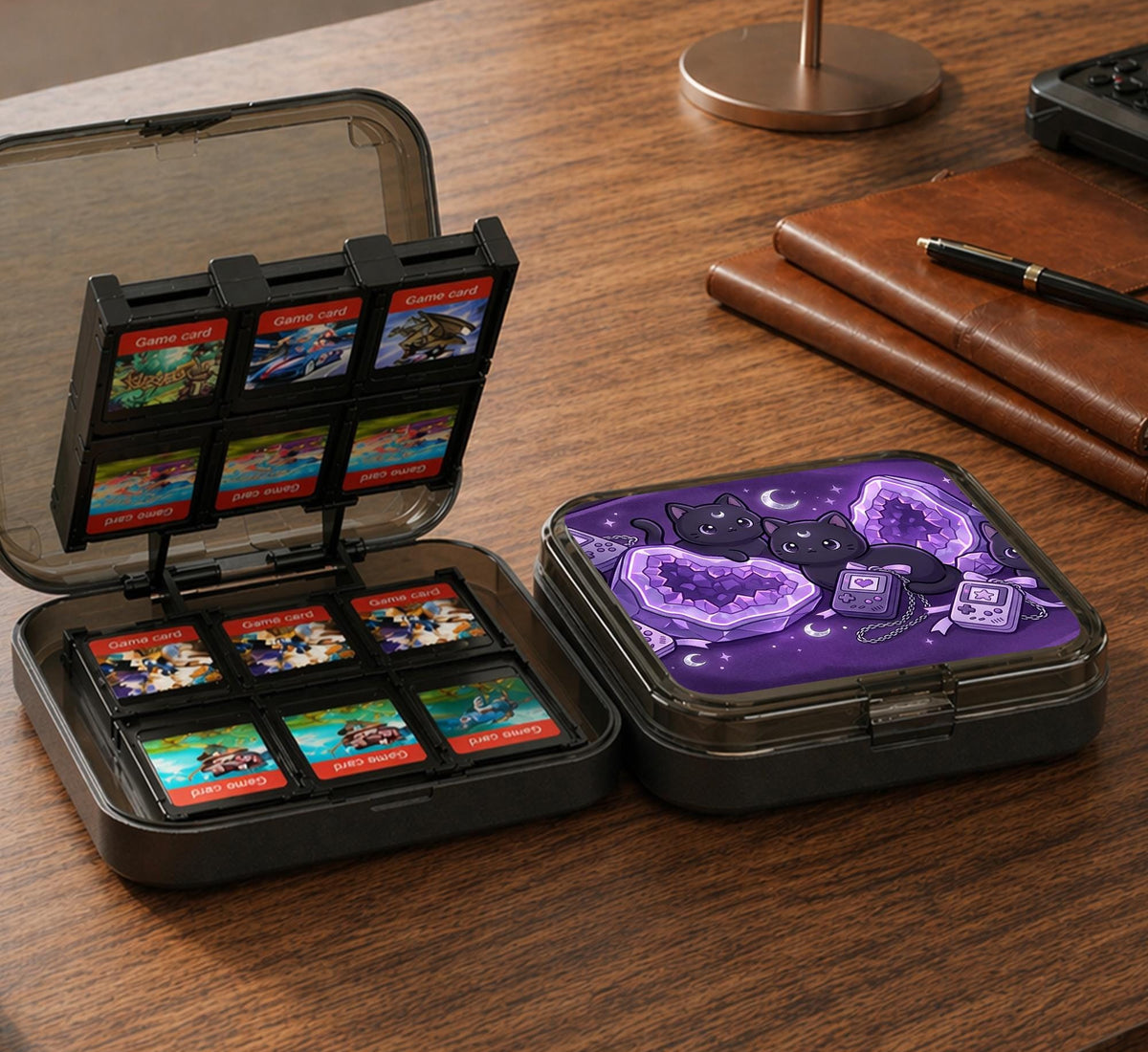 Purple carrying case with black cat faces, moon shapes, stars, and crystal geode style artwork for Nintendo Switch.