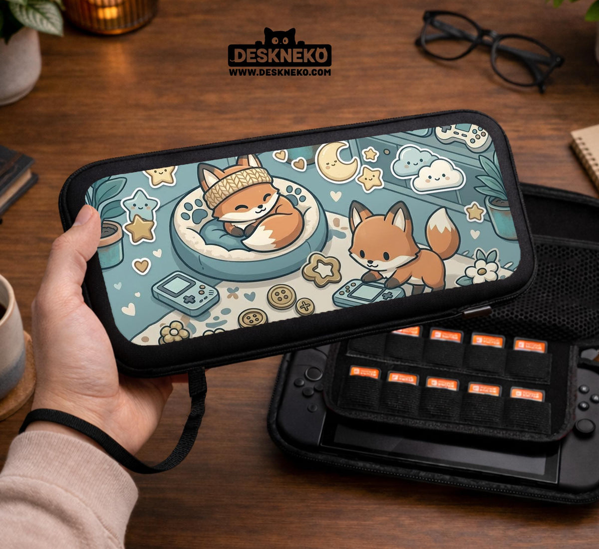 Blue Switch carrying case with cute fox characters, moon and star details, and small potted plants with beige accents.