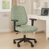 Sage green desk chair cover with a small floral and leaf print shown on an office chair.
