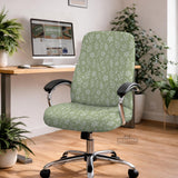 Green chair cover with a small botanical floral print in sage and cream.