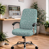 Mint and white botanical desk chair cover with a floral leaf pattern shown on an office chair.