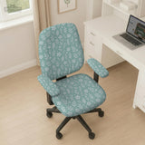 Mint and white botanical desk chair cover with a floral leaf pattern shown on an office chair.