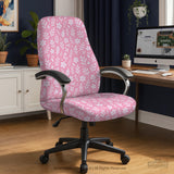 Soft pink floral chair cover shown on a gaming chair with a high back and armrests.
