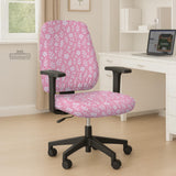 Blush pink chair cover with a small botanical floral pattern shown on an office chair.