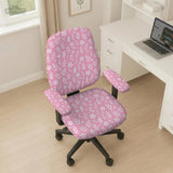 Soft pink floral chair cover shown on a gaming chair with a high back and armrests.