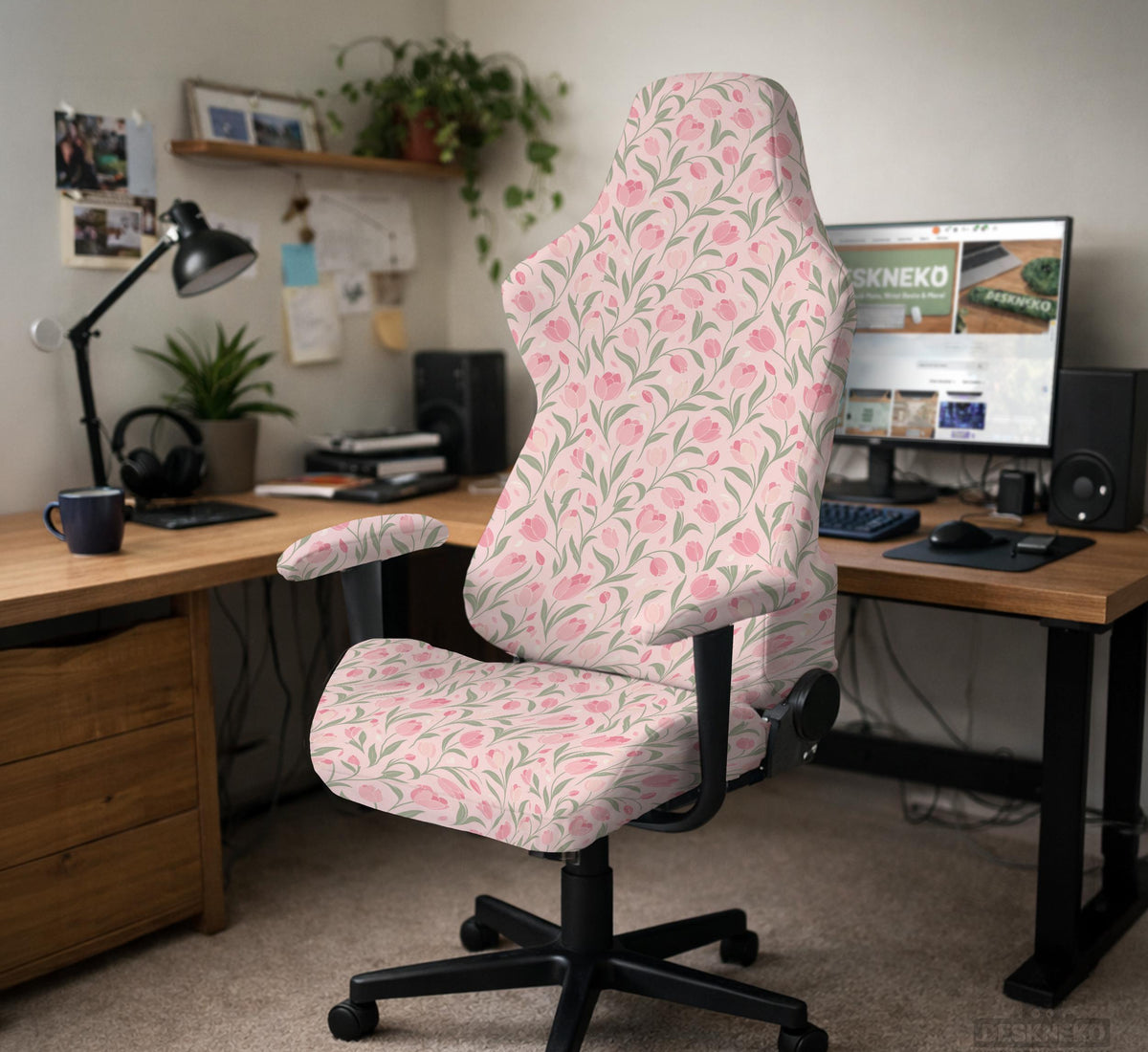 Pink chair cover with a tulip floral print shown as a desk chair slipcover, with armrest covers and size options.