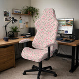 Pink floral stretch chair cover with a tulip pattern shown on a high-back gaming or office chair.