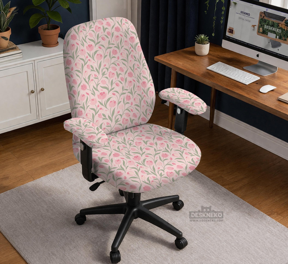 Pink floral stretch chair cover with a tulip pattern shown on a high-back gaming or office chair.