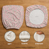 Pink floral stretch chair cover with a tulip pattern shown on a high-back gaming or office chair.