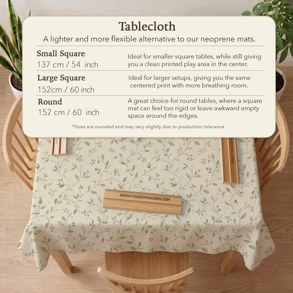 Sage green mahjong mat with vine and botanical artwork in cream neutral tones, shown in a cottagecore style with a tablecloth-style format.
