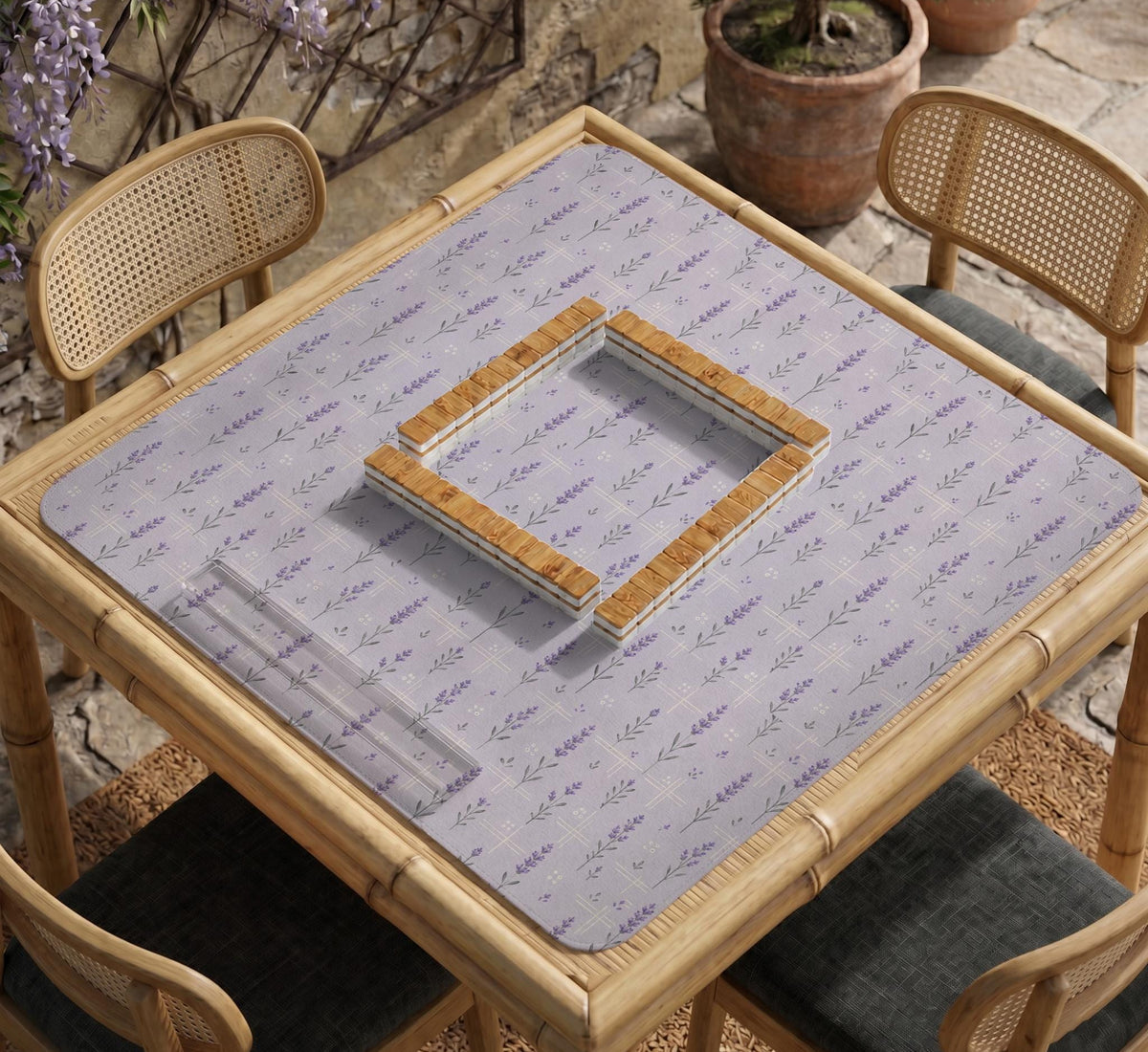 Lavender mahjong mat with a pale purple background, small botanical sprigs, and fine grid lines.