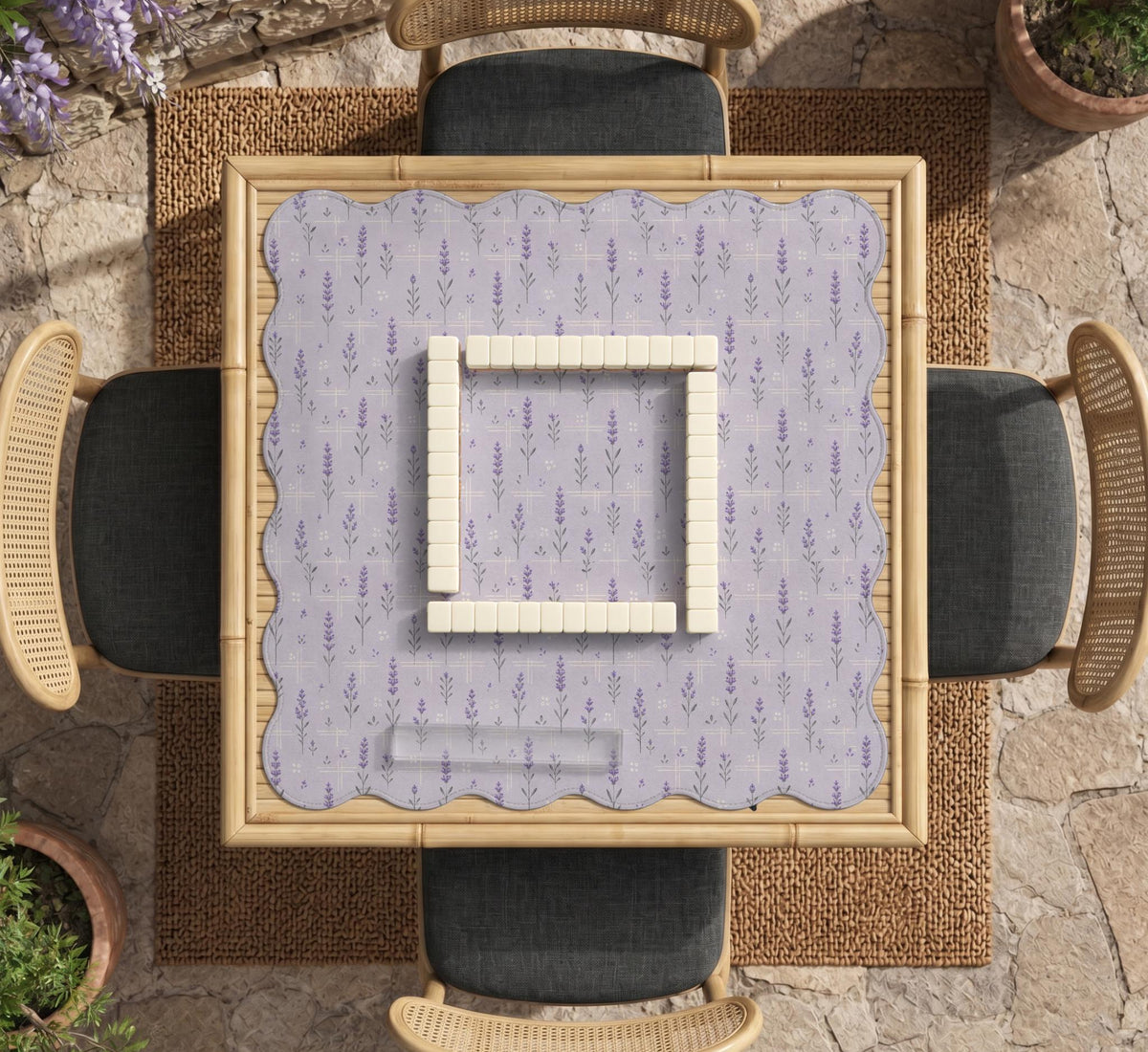 Lavender mahjong mat with a pale purple background, small botanical sprigs, and fine grid lines.