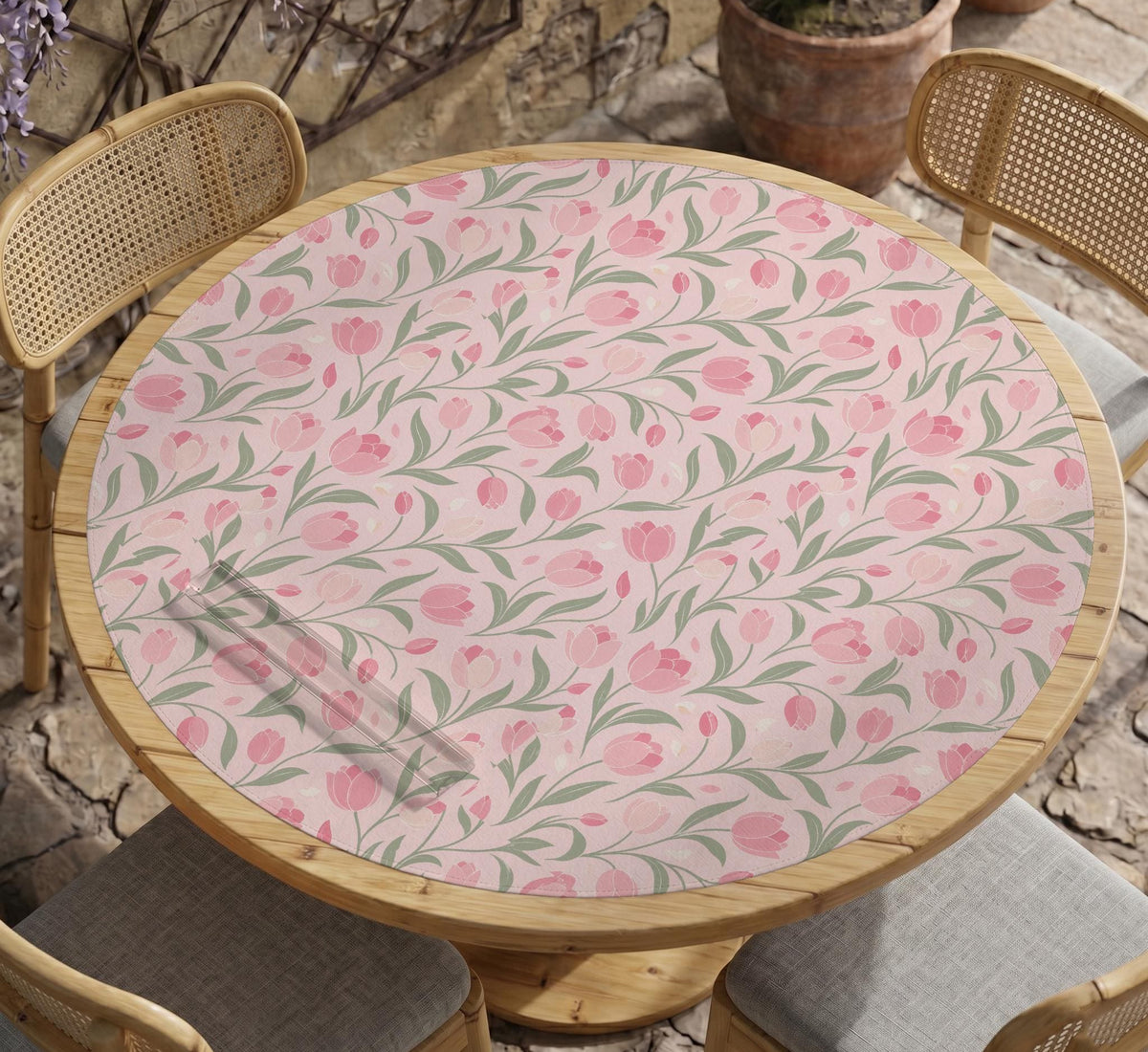Pink mahjong mat with a tulip floral pattern in blush and sage tones and a scalloped edge.