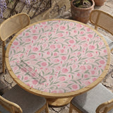 A pink mahjong mat with tulip flowers, sage leaves, and a light pastel background.