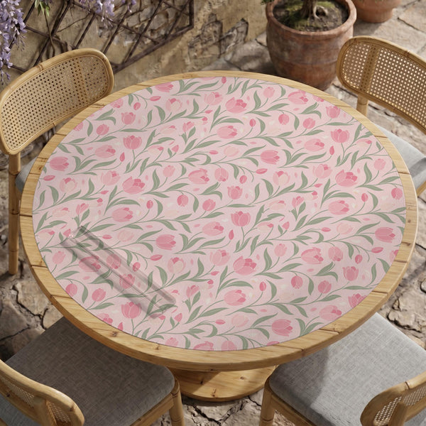 A pink mahjong mat with tulip flowers, sage leaves, and a light pastel background.