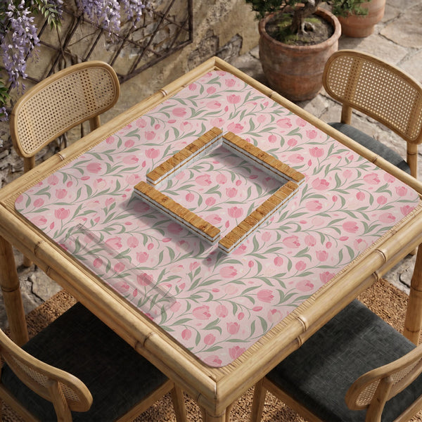 Pink mahjong mat with a botanical tulip floral pattern in blush tones, shown in a tablecloth-style square layout.