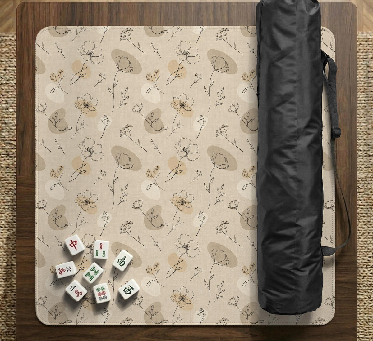 Neutral floral mahjong mat with delicate botanical line art and a scalloped edge on a cream background.