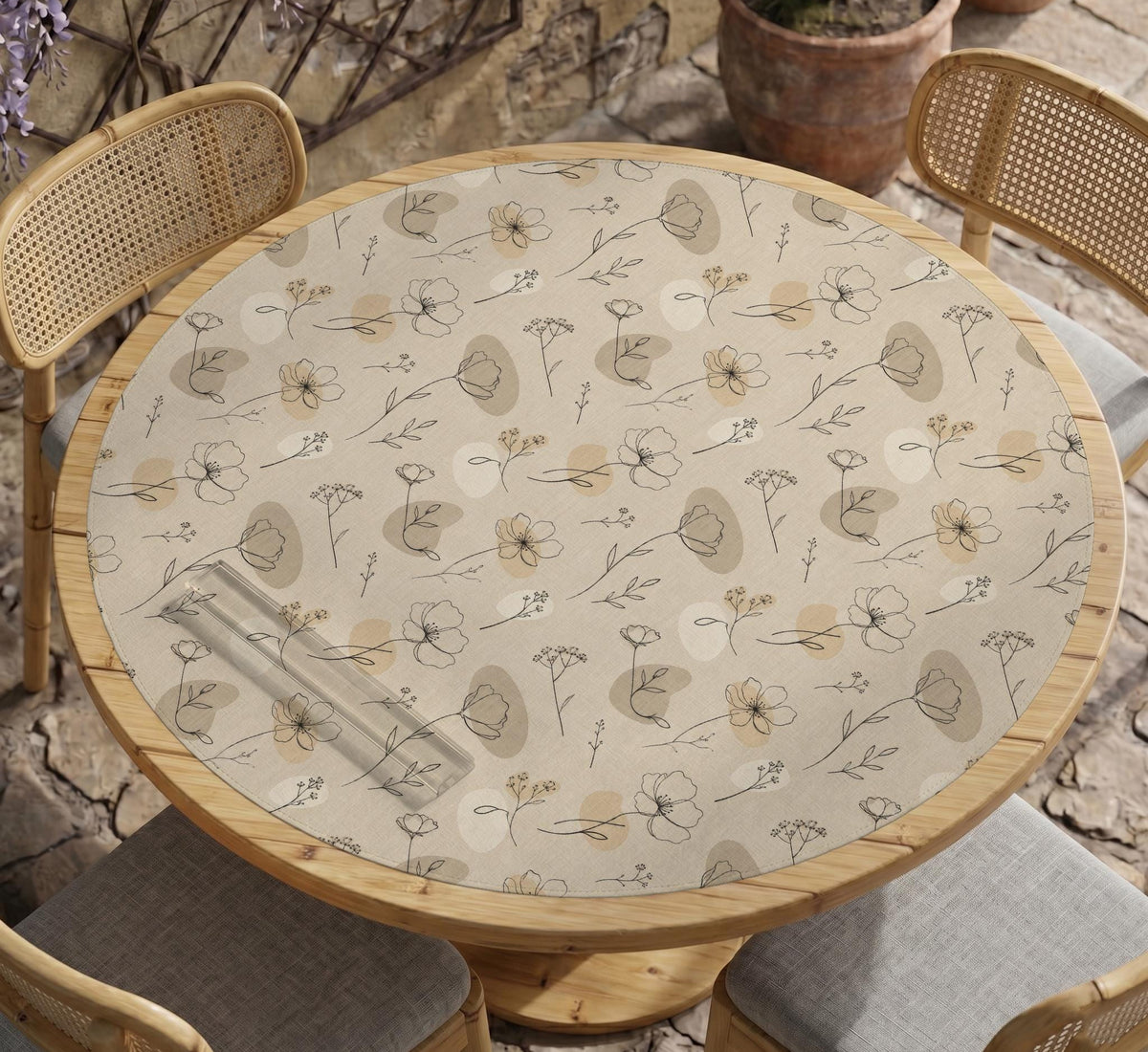 Neutral floral mahjong mat with delicate botanical line art and a scalloped edge on a cream background.