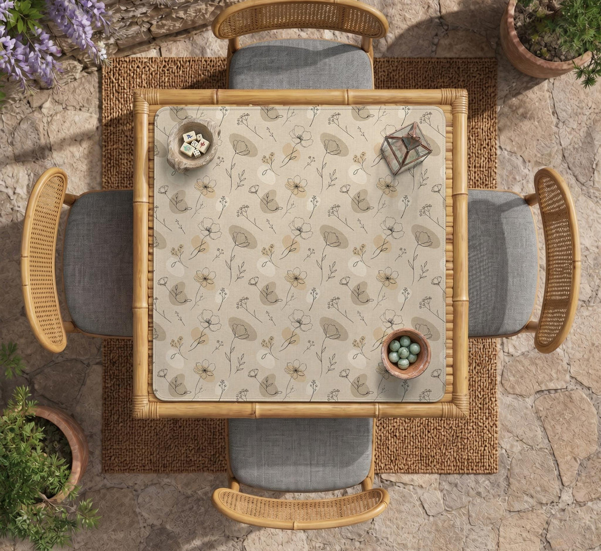 Neutral floral mahjong mat with delicate botanical line art and a scalloped edge on a cream background.