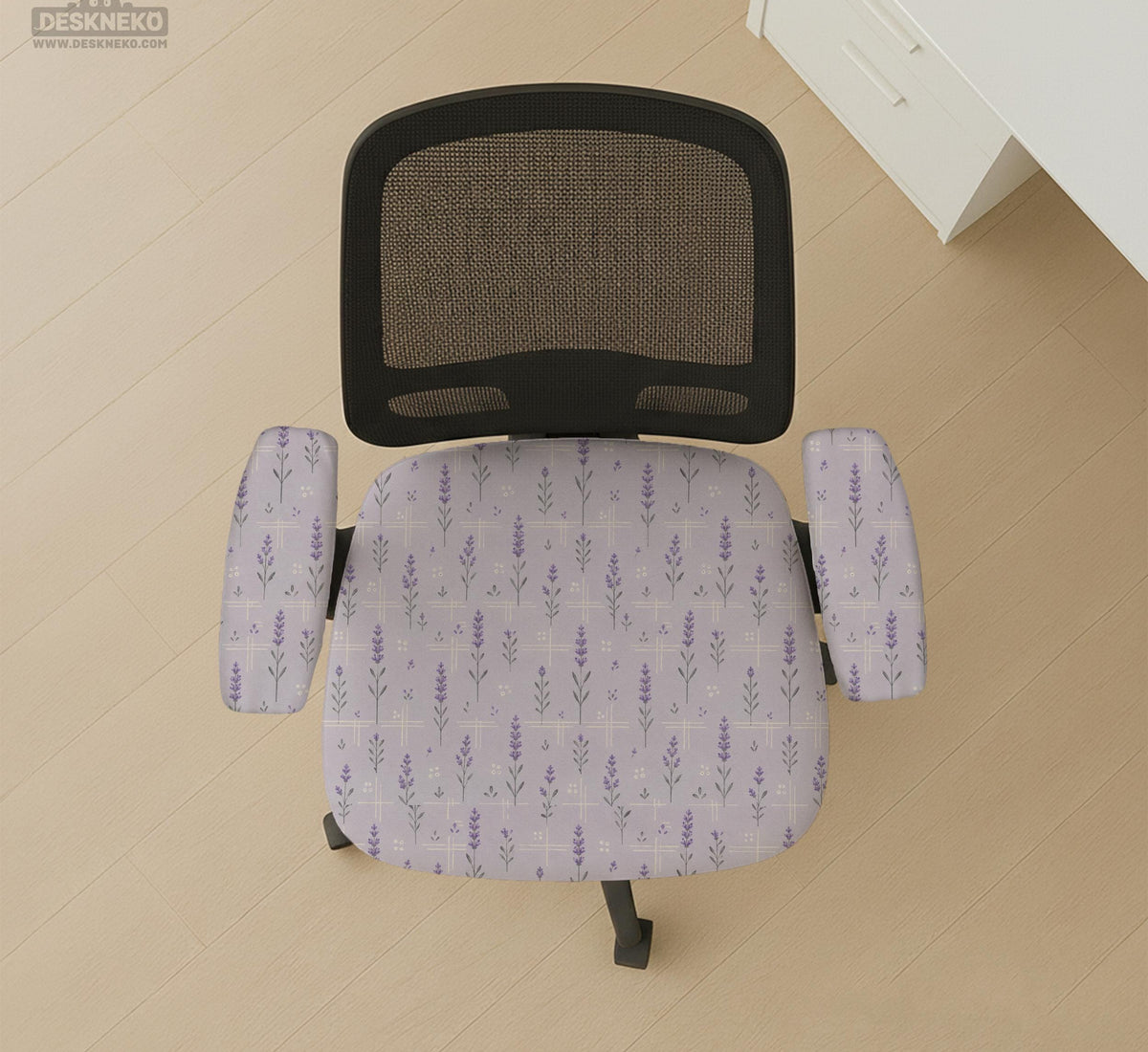 Lavender floral office chair cover with a light neutral background and small purple flower pattern.