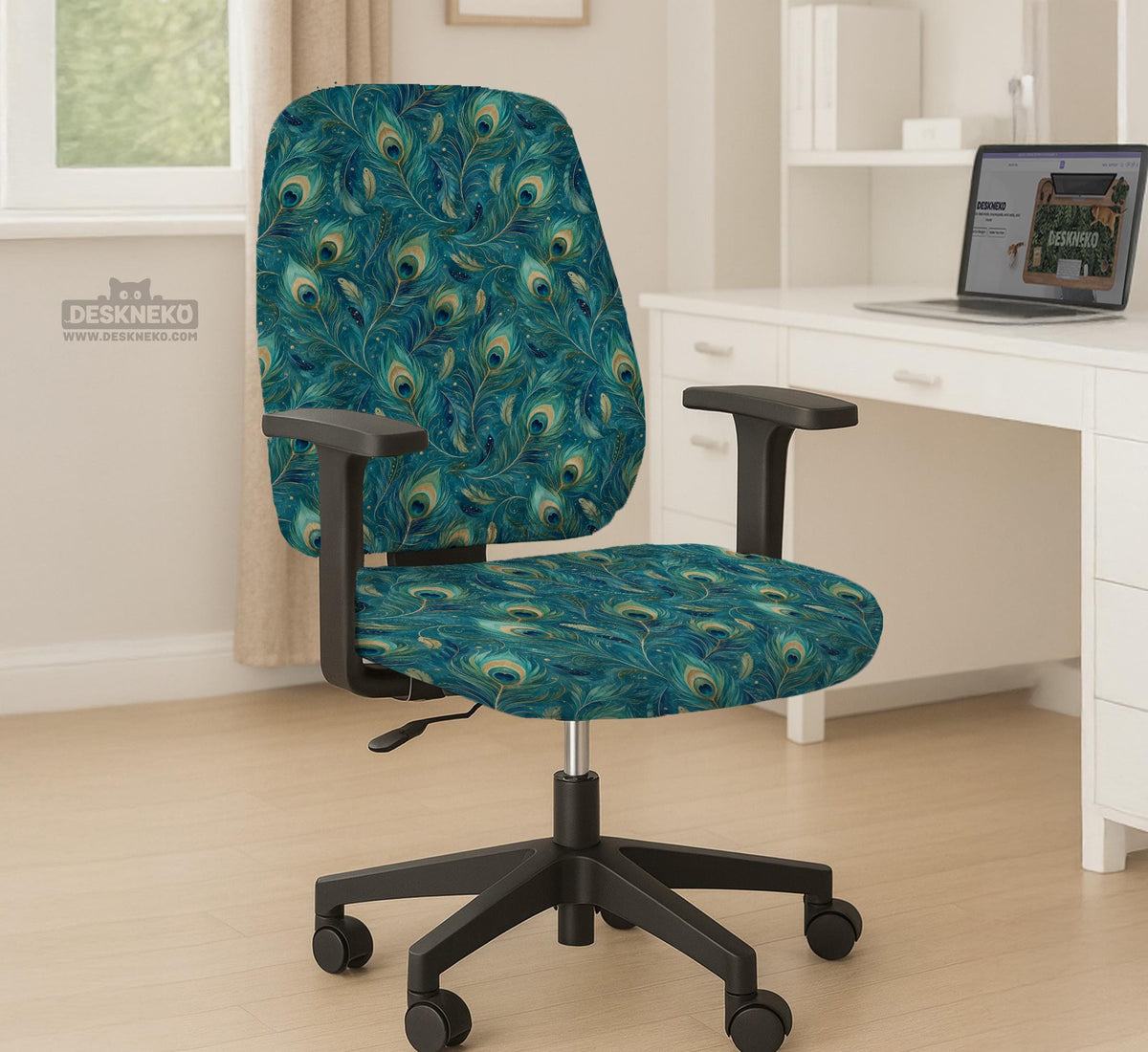 A blue green chair cover with a peacock feather design shown on an office chair with armrests.