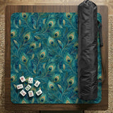 Teal mahjong mat with a peacock feather pattern in blue green tones.