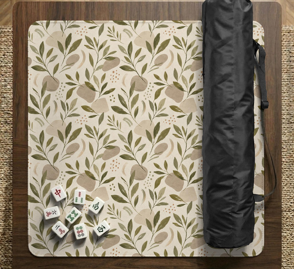 Green botanical mahjong mat with sage leaf and floral design and a scalloped edge.