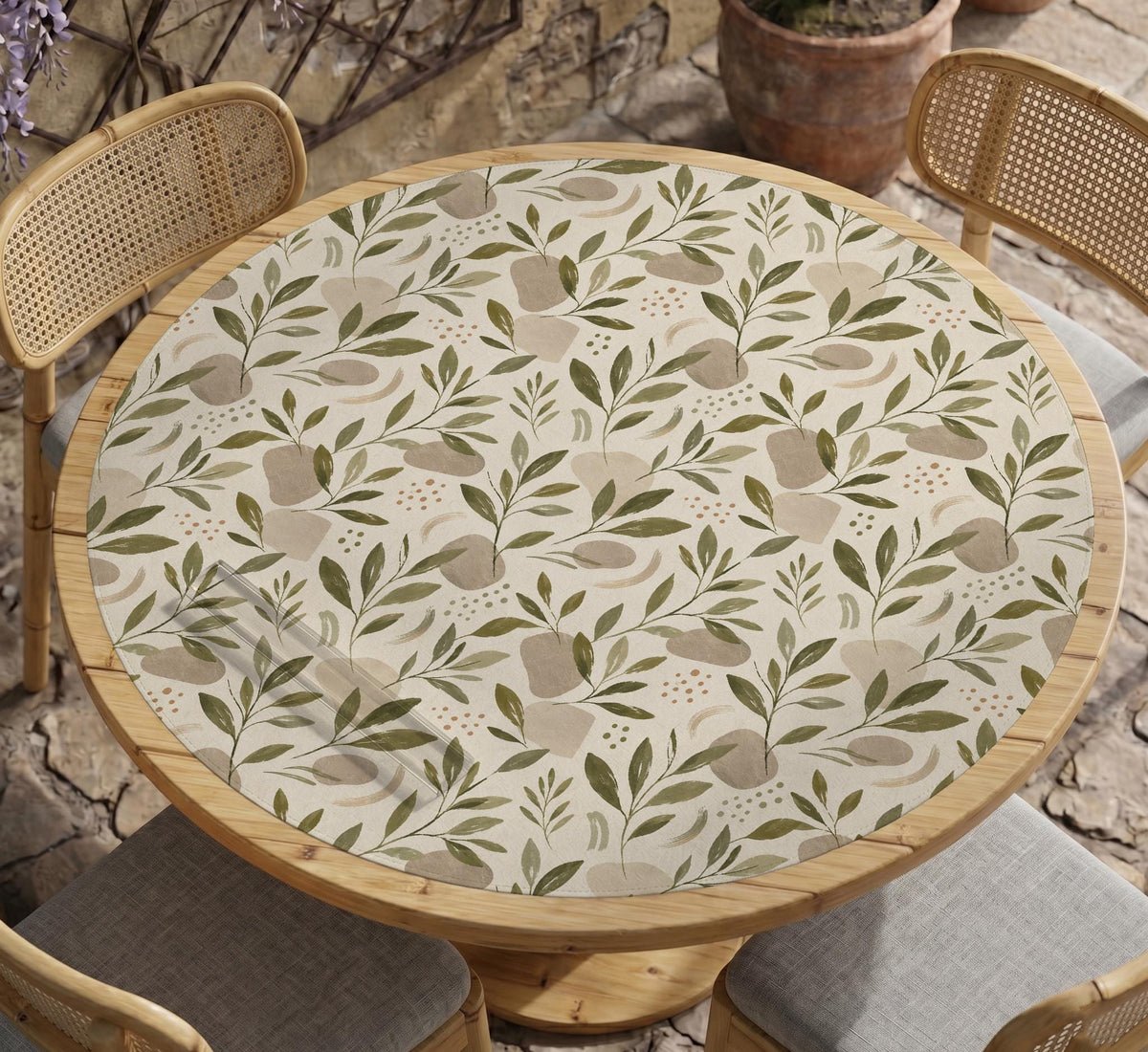 Green botanical mahjong mat with sage leaf and floral design and a scalloped edge.
