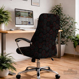 Black chair cover with a dark red geometric pattern shown on an office chair, with a fitted stretch look.