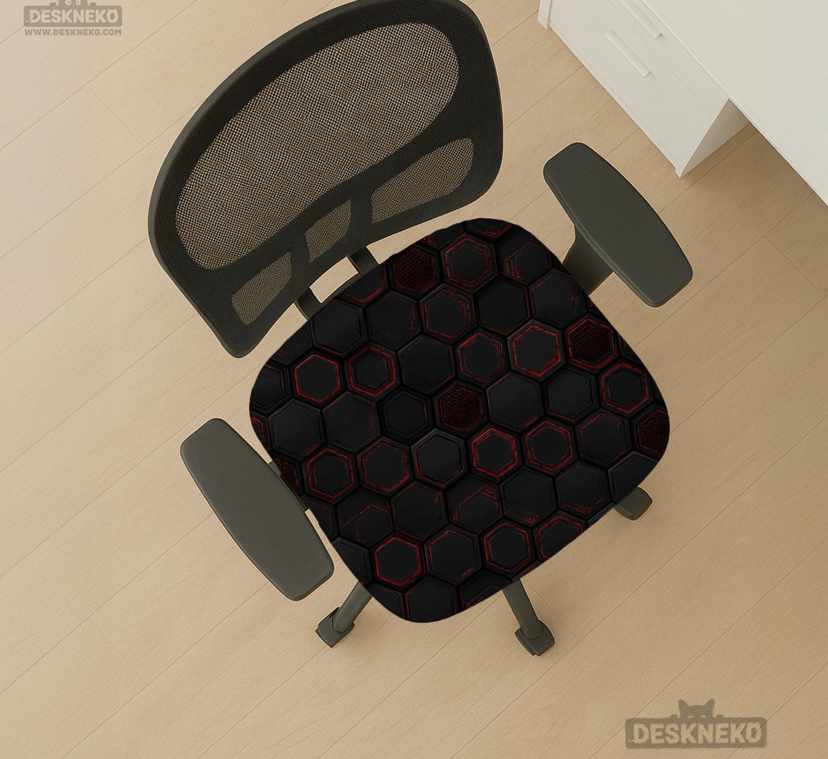 Black chair cover with a dark red geometric pattern shown on an office chair, with a fitted stretch look.